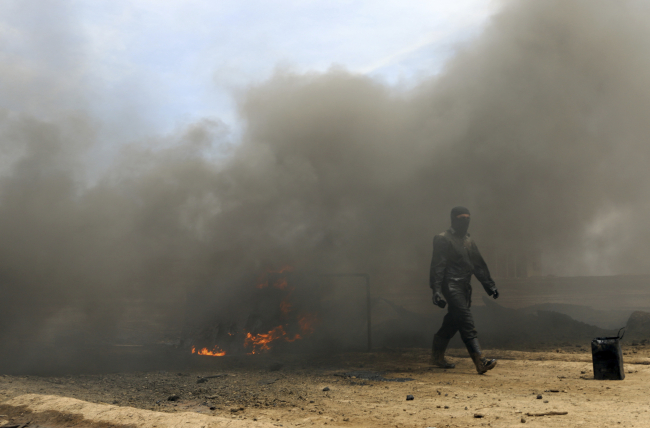 PKK/YPG işgalindeki Haseke'de bulunan bir petrol rafinerisi. Fotoğraf: Reuters