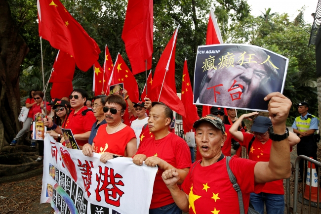 ABD'nin Çin'e açtığı ticaret savaşı Hong Kong'da protesto edildi