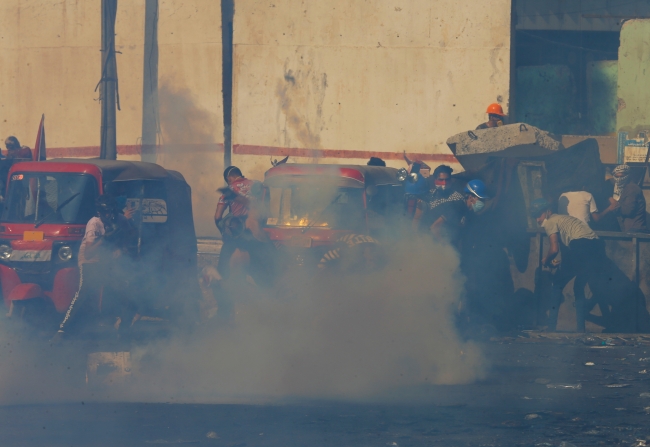 Irak'ta halk, işsizlik, yolsuzluk ve kamu hizmeti yetersizliği gerekçesiyle ülke genelinde protesto gösterileri düzenliyor. Fotoğraf: Reuters