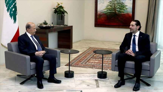 Lübnan Cumhurbaşkanı Mişel Avn (solda) ile hükümet kurma görevini üstlenen Saad Hariri (sağda). Fotoğrf: AA