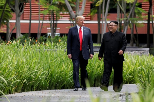 ABD Başkanı Donald Trump ile Kuzey Kore lideri Kim Jong-un Singapur'da. 12 Haziran 2018. Fotoğraf: Reuters