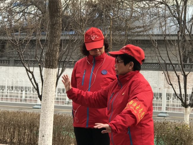 Pekin sokakları yüz binlerce gönüllünün gözetiminde